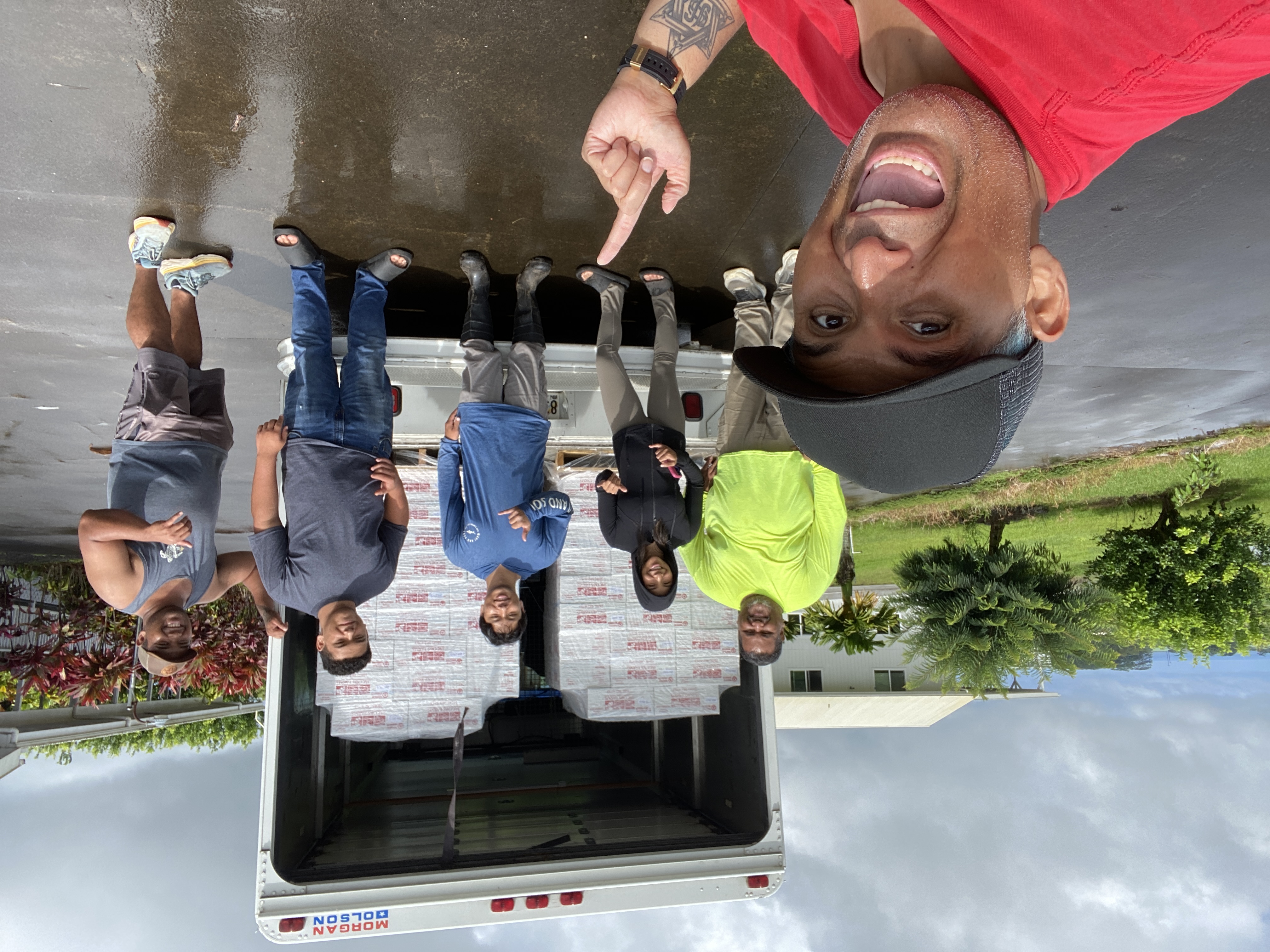 The Kaumahana Crew shares a moment with Chanel and Gavin on pickup day