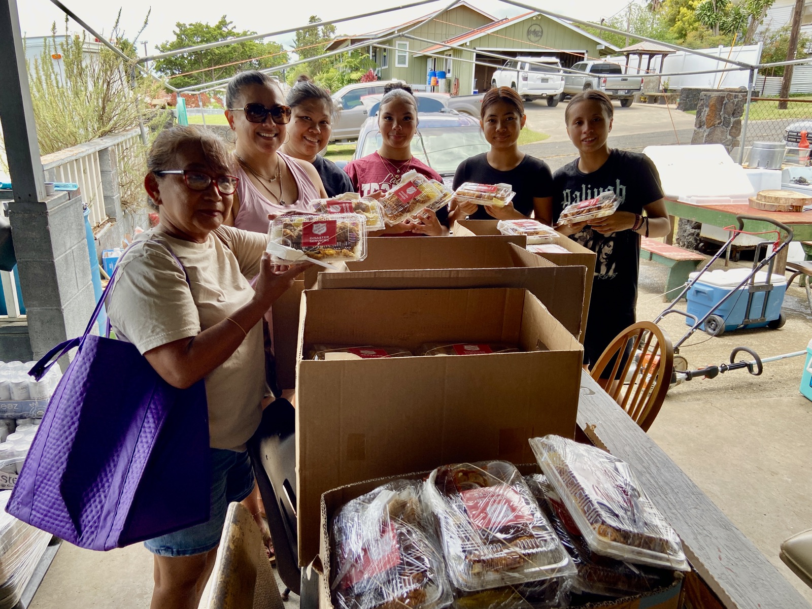 Tina Eder, the Eder ohana and friends helping with Salvation Army meal deliveries for Pāhala seniors